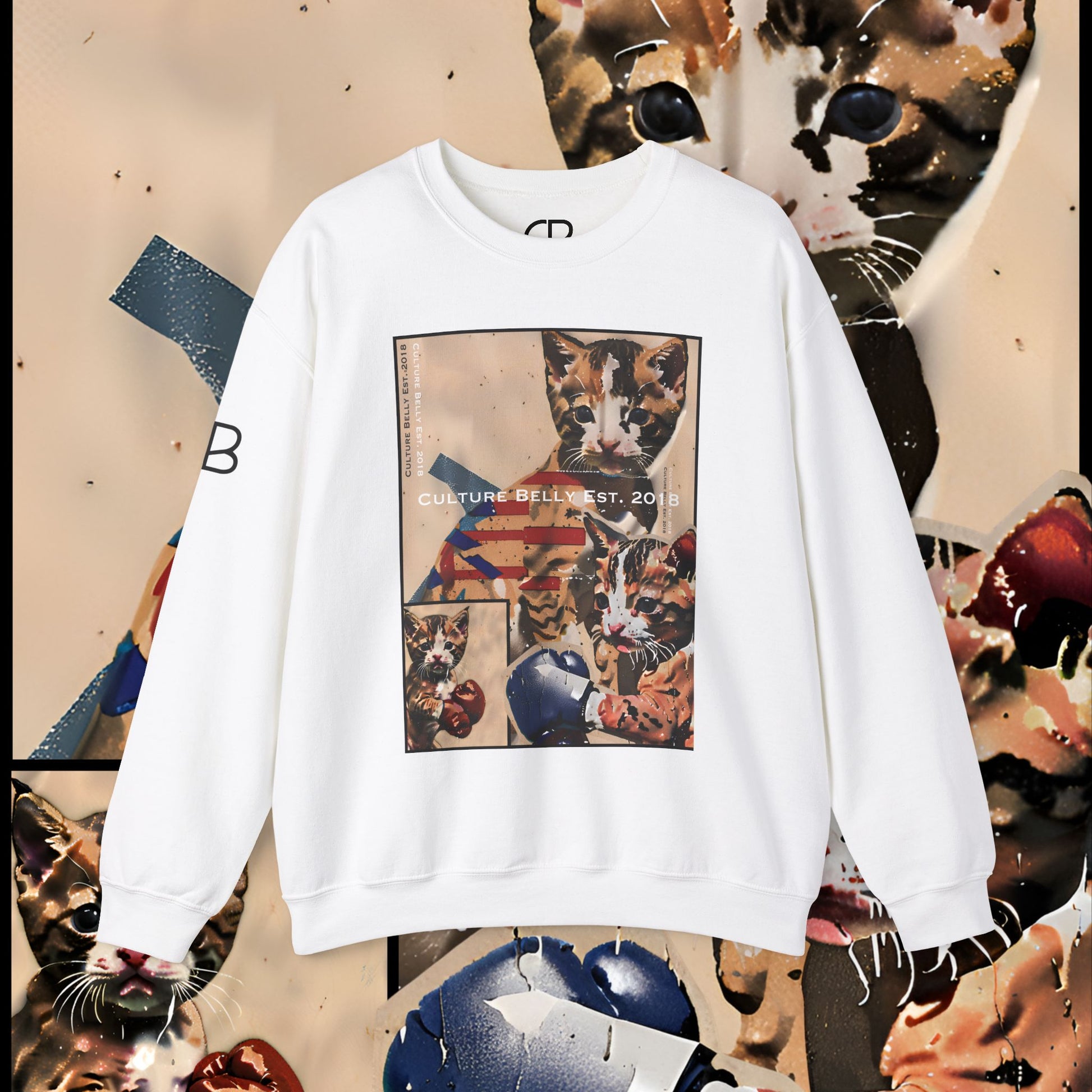 Paws of Fury: The Undercat Champion design on a white sweater, featuring a fierce kitten in boxing gloves, symbolizing resilience, determination, and the fighter spirit.