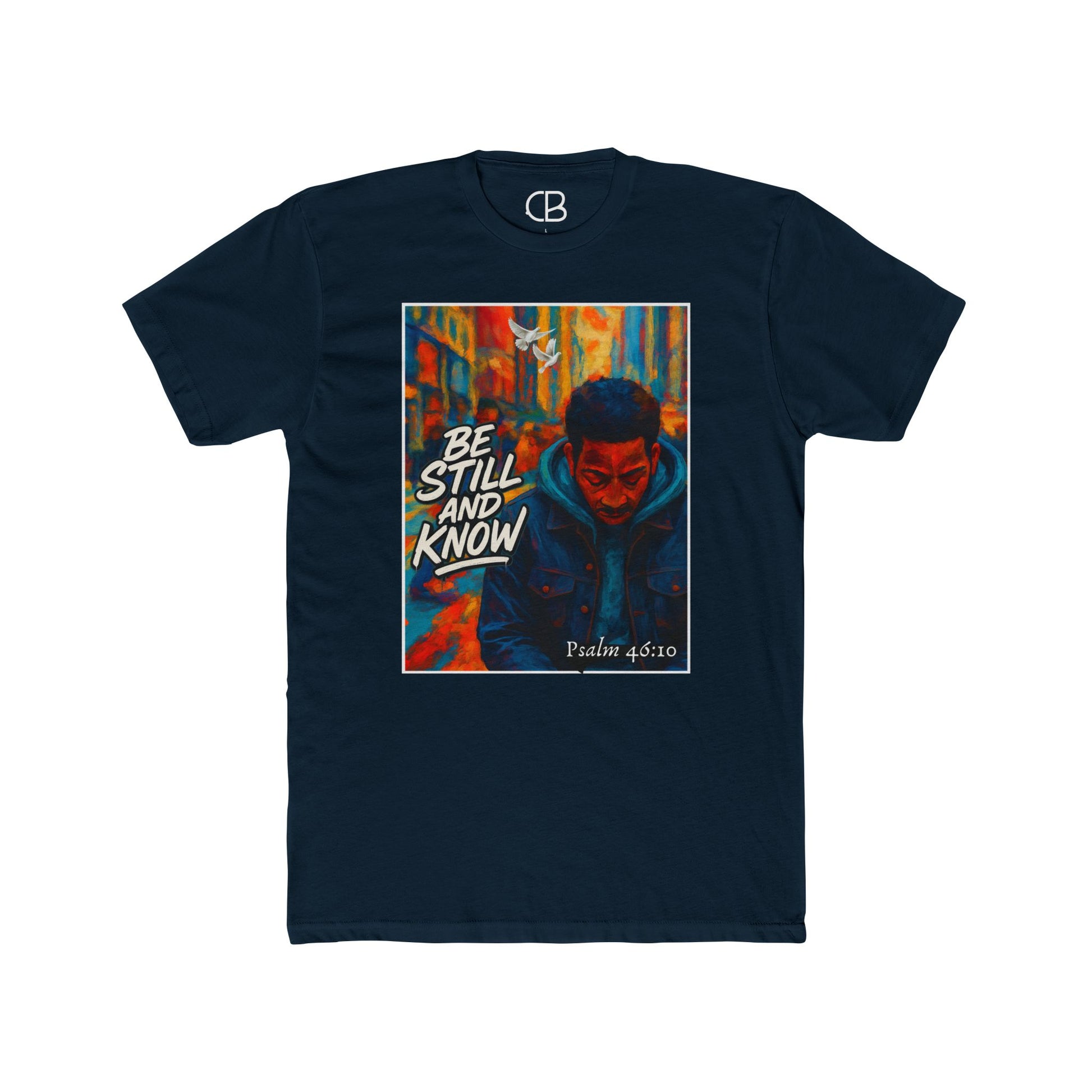 Solid Midnight Navy T-shirt featuring the Be Still And Know graphic with an urban portrait, a white dove, vibrant city artwork, and Psalm 46:10 scripture.