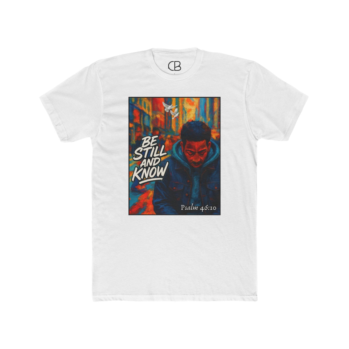 Solid white T-shirt featuring the Be Still And Know graphic with an urban portrait, a white dove, vibrant city artwork, and Psalm 46:10 scripture.
