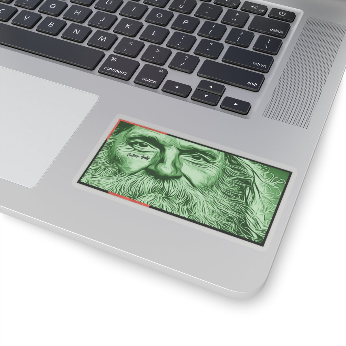 Bearded Traveler vinyl sticker featuring a detailed green-toned portrait of a bearded traveler with subtle Culture Belly branding, shown applied to a laptop.