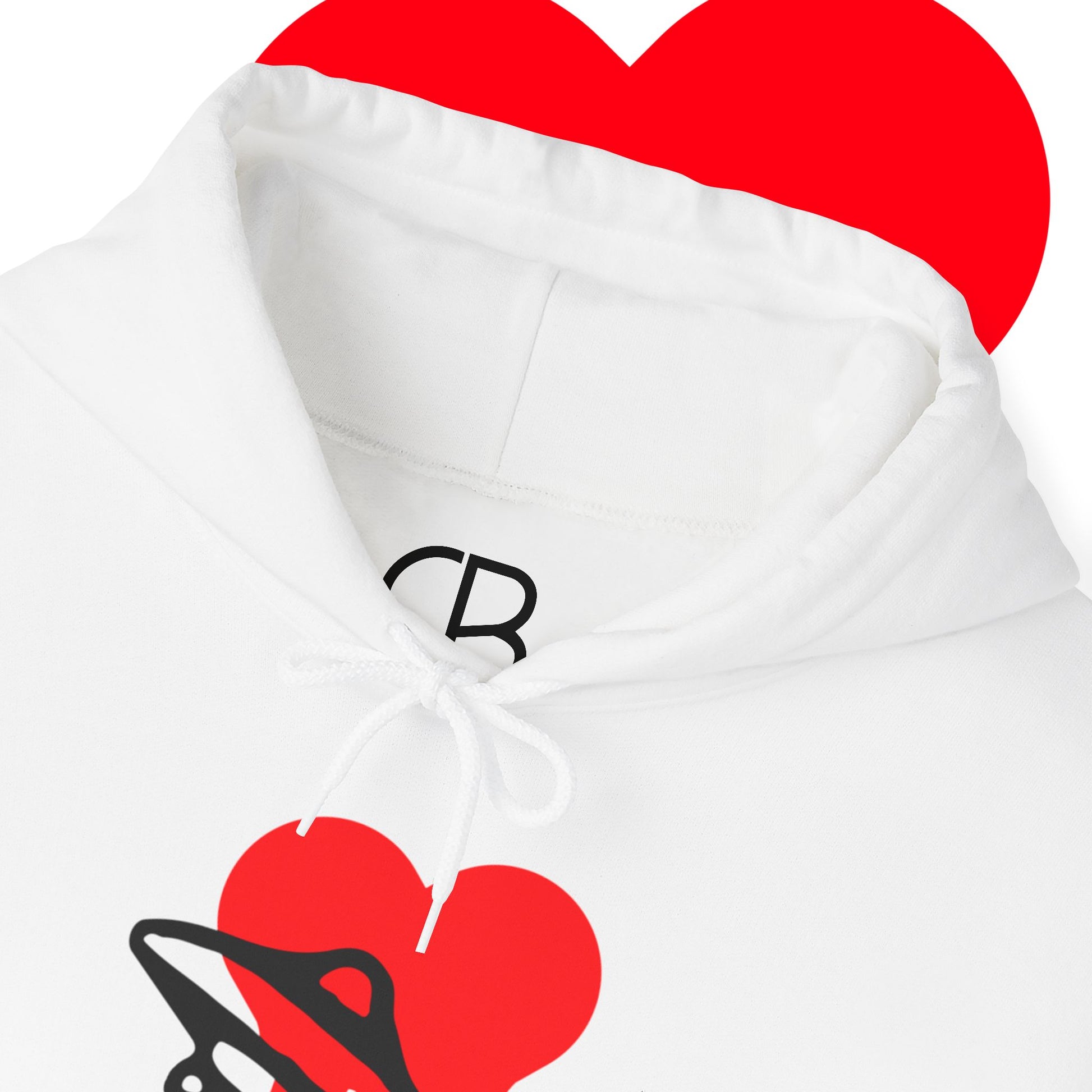 Close-up of the White Love & Space pullover hoodie featuring a red heart wrapped by a black UFO graphic with white drawstrings and the CB neck logo.