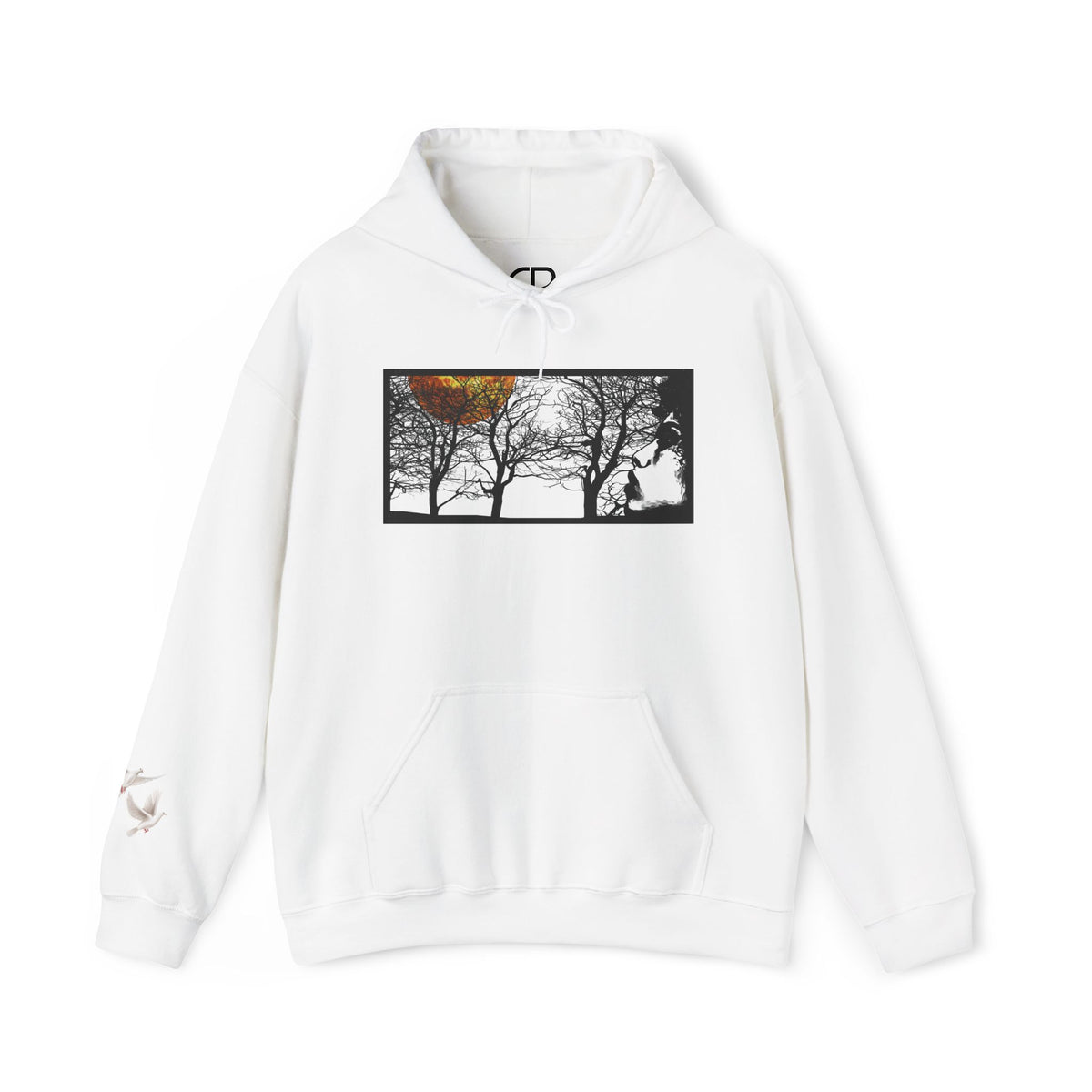 White Through The Wilderness pullover hoodie featuring a black-and-white forest landscape graphic with a glowing autumn leaf on the front and a small bird logo on the left sleeve.